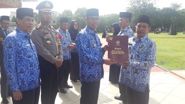 HUT PGRI ke 47, Bupati Mursini Ajak Guru Selalu Profesional dan Disiplin